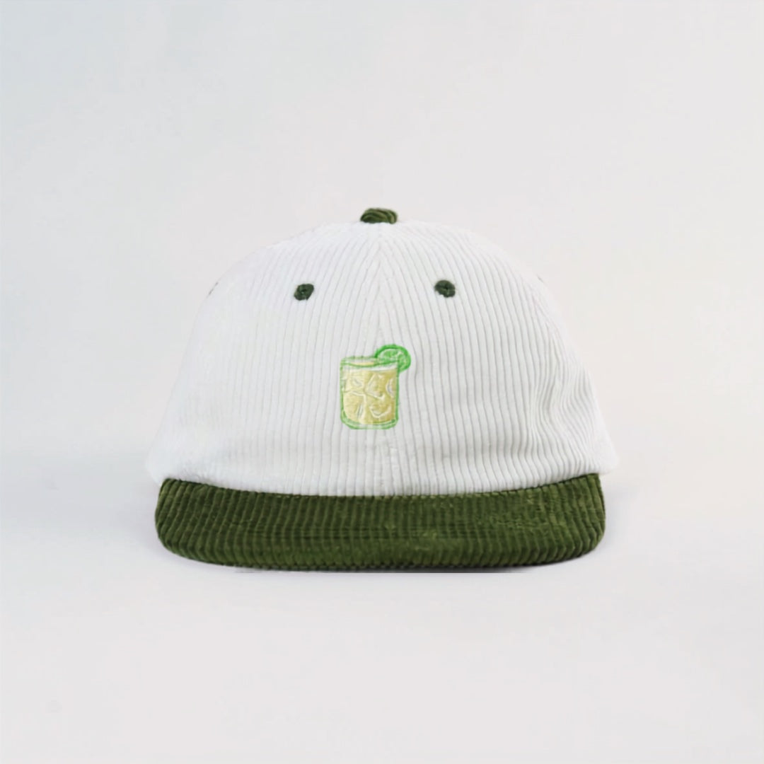 Coco Loco x Lies Collective Margarita corduroy hat, embroidered margarita glass on white corduroy with olive brim, front view