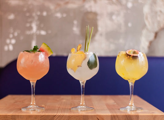 Tropical Brunch Mimosa cocktails in elegant coupe glasses. Photo by Louis Hansel on Unsplash