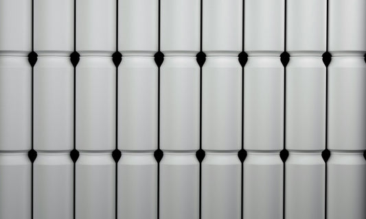 Stack of white Coco Loco drink cans