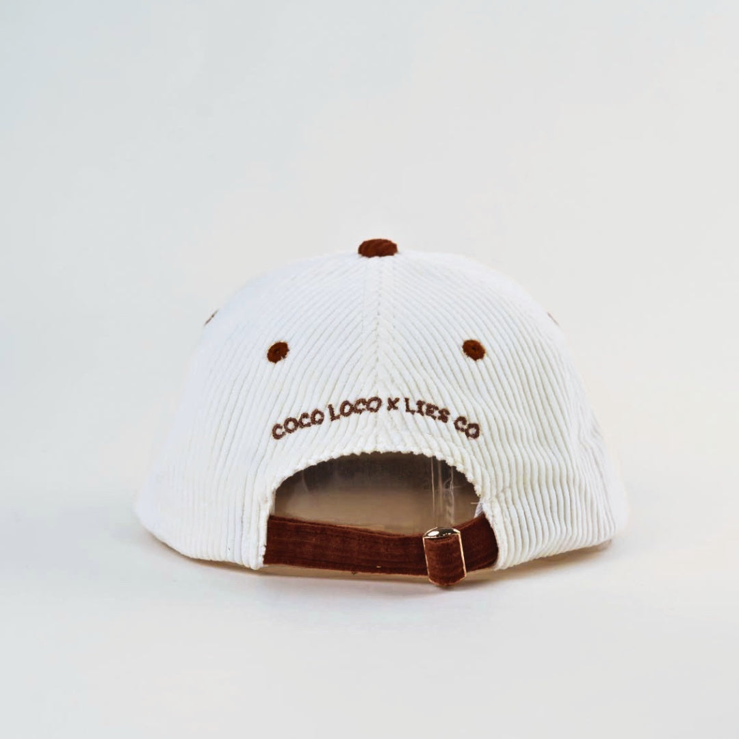 Coco Loco x Lies Collective Passiona cap, white corduroy with brown brim and adjustable silver clip, back view
