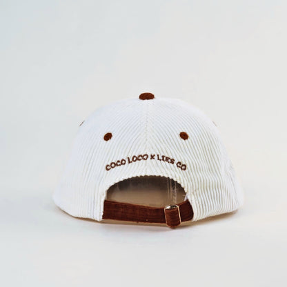 Coco Loco x Lies Collective Passiona cap, white corduroy with brown brim and adjustable silver clip, back view