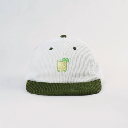 Coco Loco x Lies Collective Margarita corduroy hat, embroidered margarita glass on white corduroy with olive brim, front view